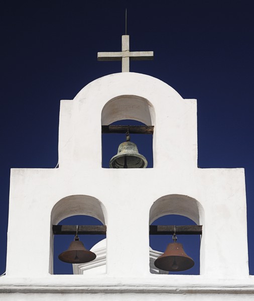 USA, Arizona, Tucson, Mission Church of San Xavier del Bac. White painted bell tower with three