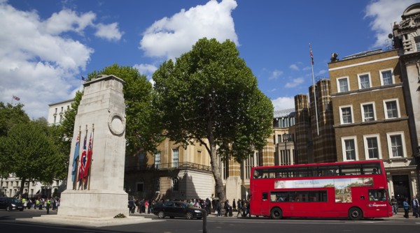 England, London, Westminster Whitehall the Cenotaph with protesters outside the Department for