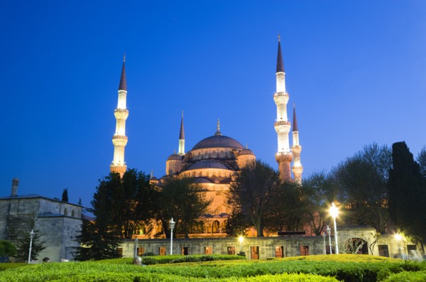 Turkey, Istanbul, Sultanahmet Camii The Blue Mosque domes and minarets at sunset with son et