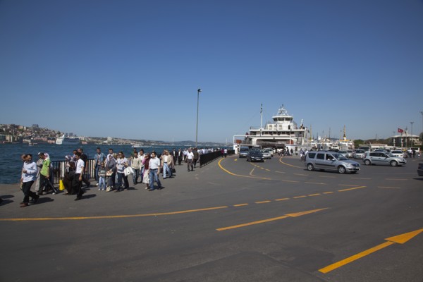 Turkey, Istanbul, Sirkeci ferry terminal with cars and passengers disembarking. 
Photo : Stephen