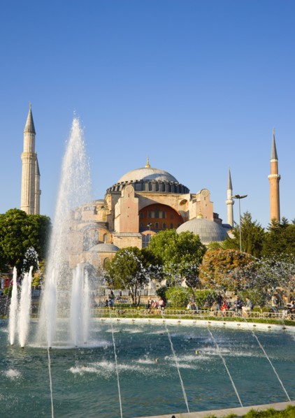 Turkey, Istanbul, Sultanahmet Haghia Sophia with dome and minarets beyond the water fountain in the