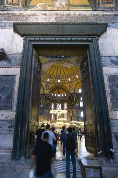 Turkey, Istanbul, Sultanahmet Haghia Sophia People walking through the Imperial Gate with mosaics