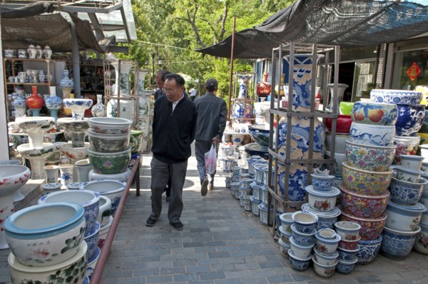 China, Jiangsu, Yangzhou, Ceramic pots for plants and decorative use in downtown canal-side street