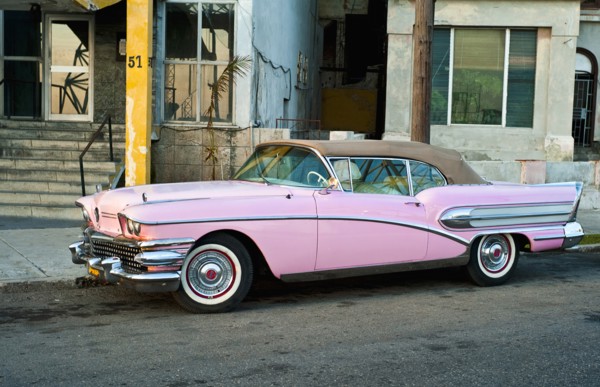 Cuba, Havana, Pink Buick convertile with the roof raised. 
Photo : Richard Rickard