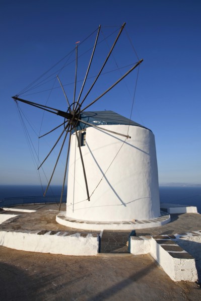 Old wind mill which is now converted to accomodation on the top of a cliff.