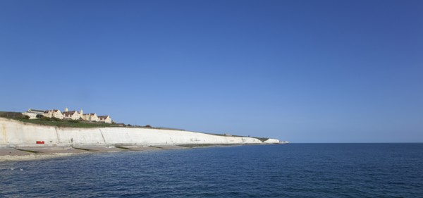 White cliff coastline with Roedean private school for girls.