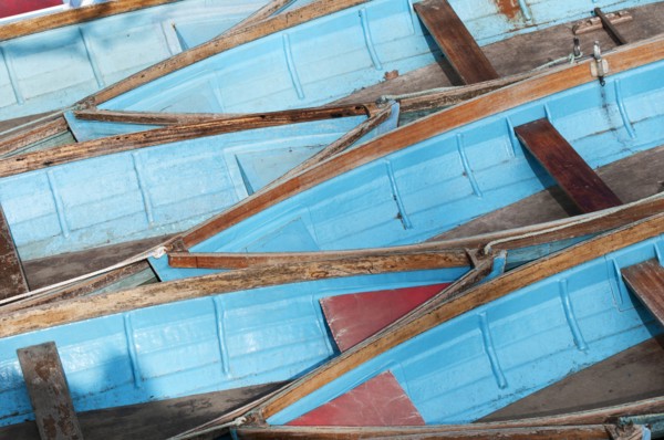 Moored rowing boats on the river Cherwell near Magdalen bridge.