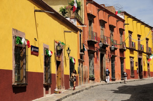 Mexico, Bajio, San Miguel de Allende, Independence Day decorations adorn colonial streets lined by