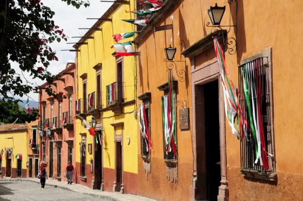 Mexico, Bajio, San Miguel de Allende, Independence Day decorations adorn colonial street lined with