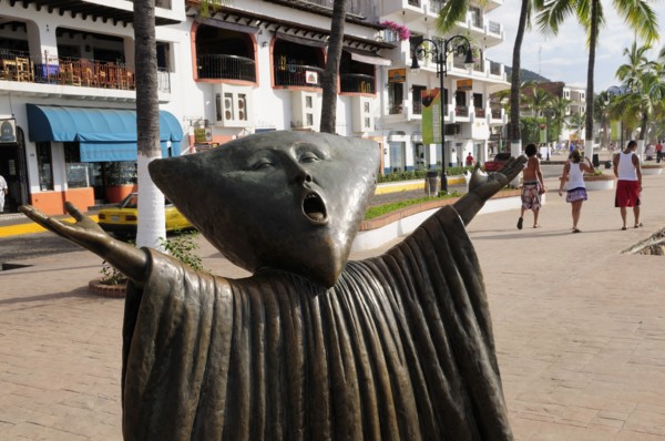 Mexico, Jalisco, Puerto Vallarta, Detail of sculpture In Search of Reason by Sergio Bustamente on