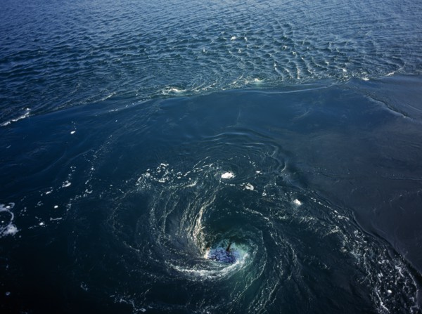 France, Bretagne, Barrage de la Rance, Rance Tidal Power Station. Whirlpool caused by tidal water