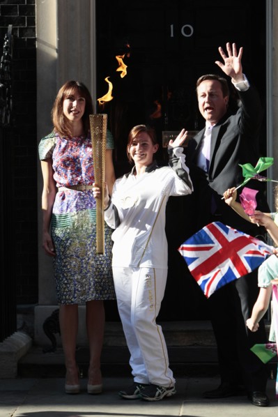 England, London, Olympic Torch relay in Downing Street Samantha and Prime Minister David Cameron
