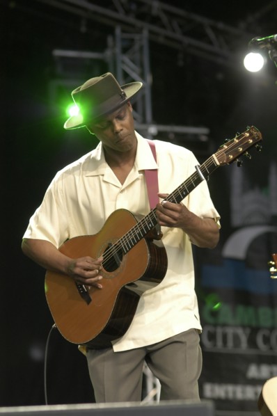 England, Cambridgeshire, Cambridge, Folk Festival Eric Bibb performing on stage with acoustic
