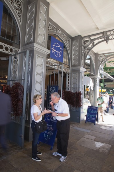 England, London, Borough Market Londons oldest fresh fruit and vegetable market tourists eating