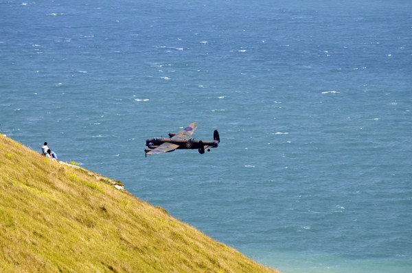 England, East Sussex, Beachy Head, Lancaster bomber taking part in the Airbourne air show. Photo :