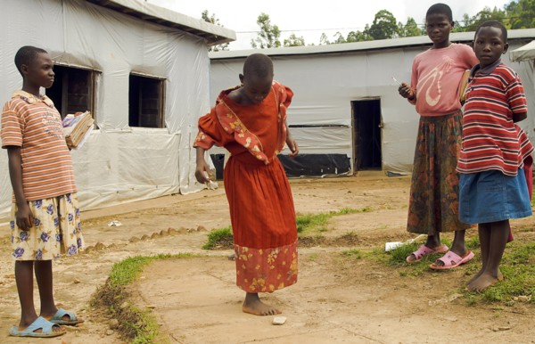 Burundi, Cibitoke Province, Mabayi, Primary School Girls playing hopscotch beside the Catch-up