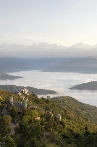 Nepal, Nagarkot, View across clouded valley towards Himalayan mountains. 
Photo Nic I Anson / Eye