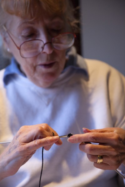 Crafts, Textiles, Knitting, Woman hand knitting wool together with needles. 
Photo Stephen