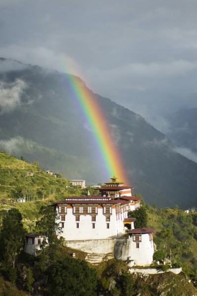 Bhutan, Lhuentse Dzong, Bhutan  Lhuentse Dzong with colourful rainbow overhead.