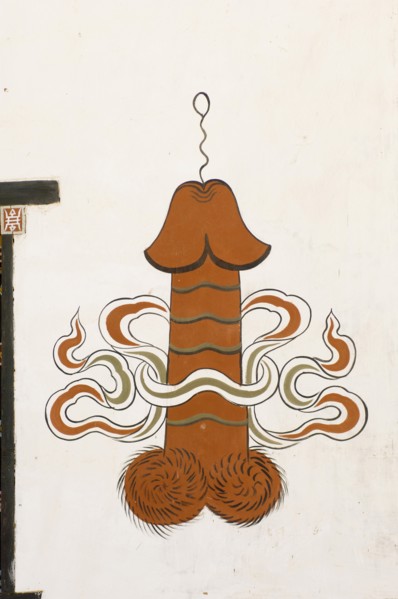 Bhutan, Punakha, Large painted penis on a house wall. . 
Photo Nic I'Anson
