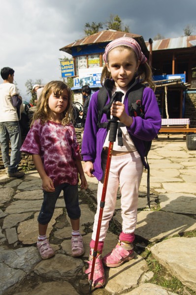 Nepal, Himalayas, Pokhara, Young English girls trekking in Nepali Himalayan hills near Pokhara.
