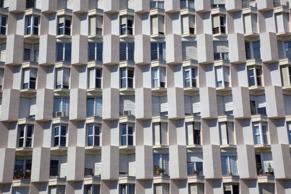 Spain, Catalonia, Barcelona, Barceloneta, Exterior of apartment block building. 
Photo Stephen