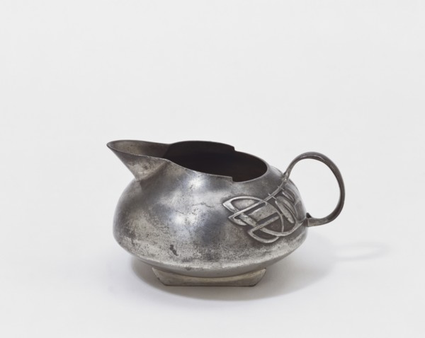 Pewter Tudric Milk Jug, by Archibald Knox. London, England, early 20th century