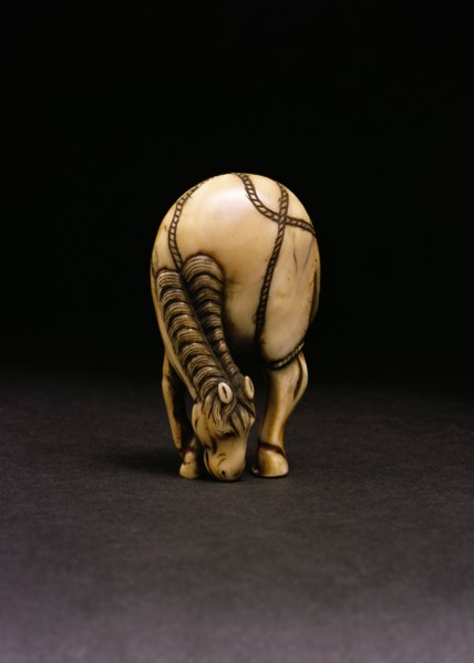 Netsuke of a grazing horse. Japan, 18th century