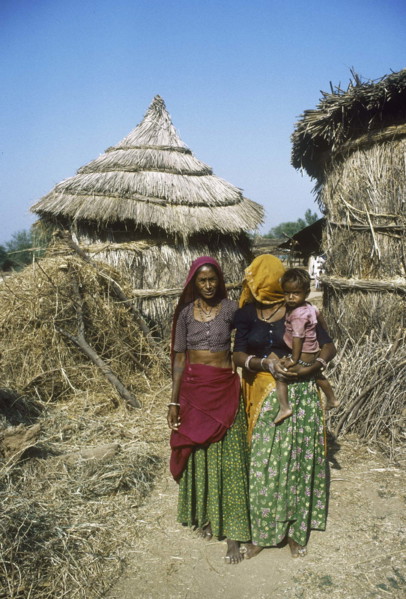On the road to Deeg, Small village with resident family