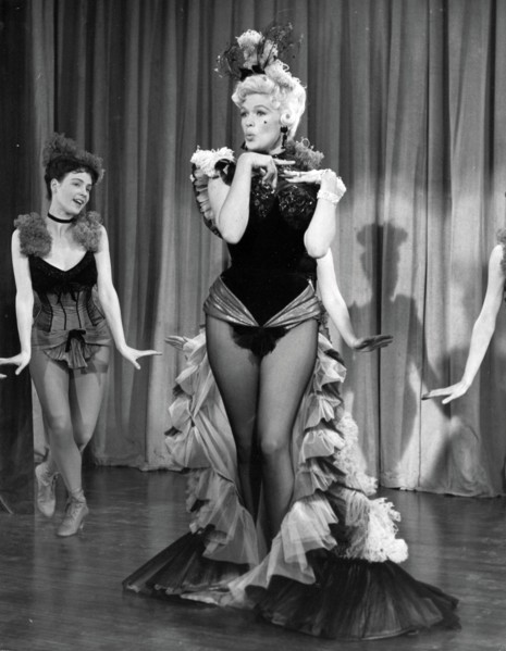 Film still of Jayne Mansfield on stage in The Sheriff of Fractured Jaw