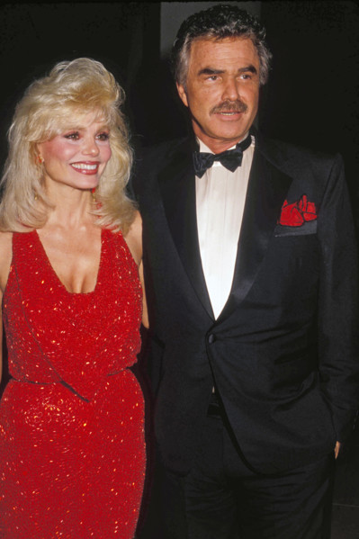 BURT REYNOLDS with LONI ANDERSON at the Golden Globe Awards in 1991. (Credit Image: © Globe