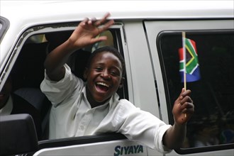 A Bafana Bafana fan shows his colours after South Africa beat Paraguay in an international friendly