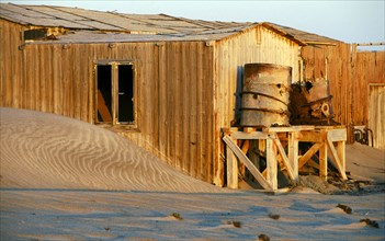 WOODEN HOUSE AT BOGENFELS IN LATE EVENING, NAMIBIA