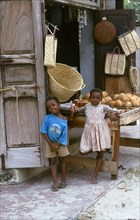 LOCAL CHILDREN AT FRUIT MARKET, TANZANIA