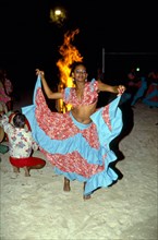 SEGA DANCER AT NIGHT, GRAND BAIE BEACH, MAURITIUS