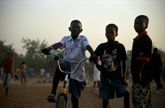 In the suburb of Corofina Nord, Bamako, Mali, young people gather in the late afternoon at a large