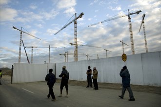 Workers arrive in the early morning to begin work on the new Greenpoint Stadium Seen from soccer
