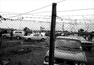 Looking through the fence from Khayamnandi Boys Home, Langa, Cape Town, South Africa,