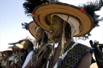 Wodaabe men perform a dance of male beauty at a festival in InGall, near Agadez in Niger on Friday