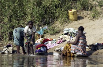 Ladies wash in the South Luangwa river.Zambia