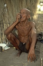 Old man smoking a pipe