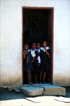Zulu school children in a doorway
