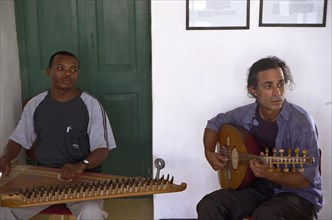 A Taarab orchestra plays in the Cultural Music Club in Stone Town, Zanzibar. It is difficult to