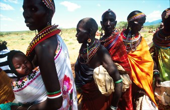 Under a baking sun Samburu women and girls line up for emergency food supplies provided by EdFri International