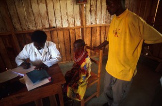 Samburu girl gets medical attention from Dr Peter Rwanda of EdFri International