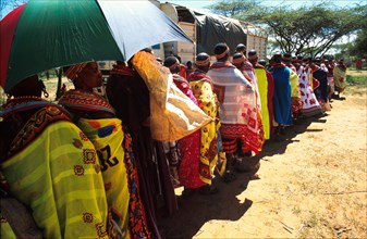 Under a baking sun Samburu women and girls line up for emergency food supplies provided by EdFri International