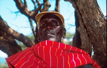 A Samburu elder wear a baseball cap - tribal meets Western