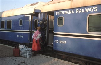 Ladies bording a train. Gaborone