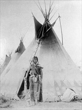 Young Black Foot North American Indian outside his tent. Photograph c1885-1890