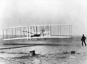 The first mechanized flight, December 17, 1903, Kitty Hawk, North Carolina.  Wilbur and Orville Wright